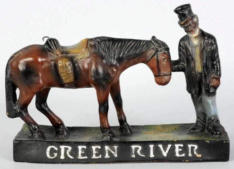 Appraisal: Green River Whiskey Advertising Figure s Hard rubber and composition