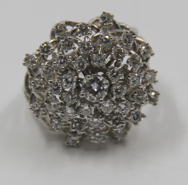 Appraisal: JEWELRY Platinum and Diamond Starburst Ring Multi tier diamond and