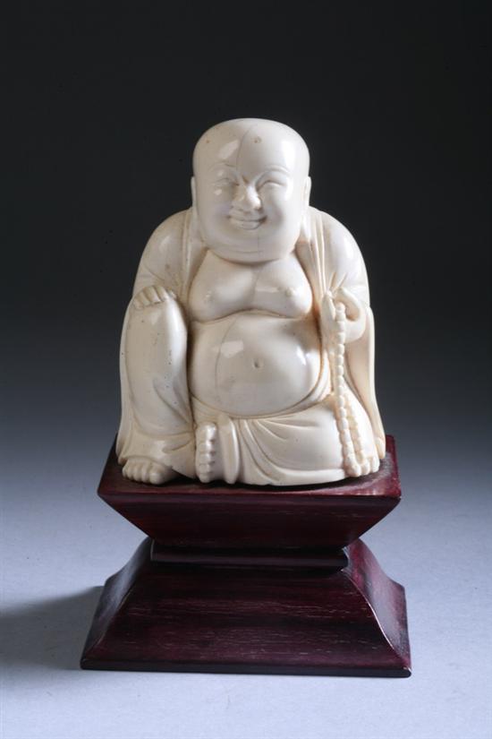 Appraisal: CHINESE IVORY FIGURE OF MONK th century Seated at ease