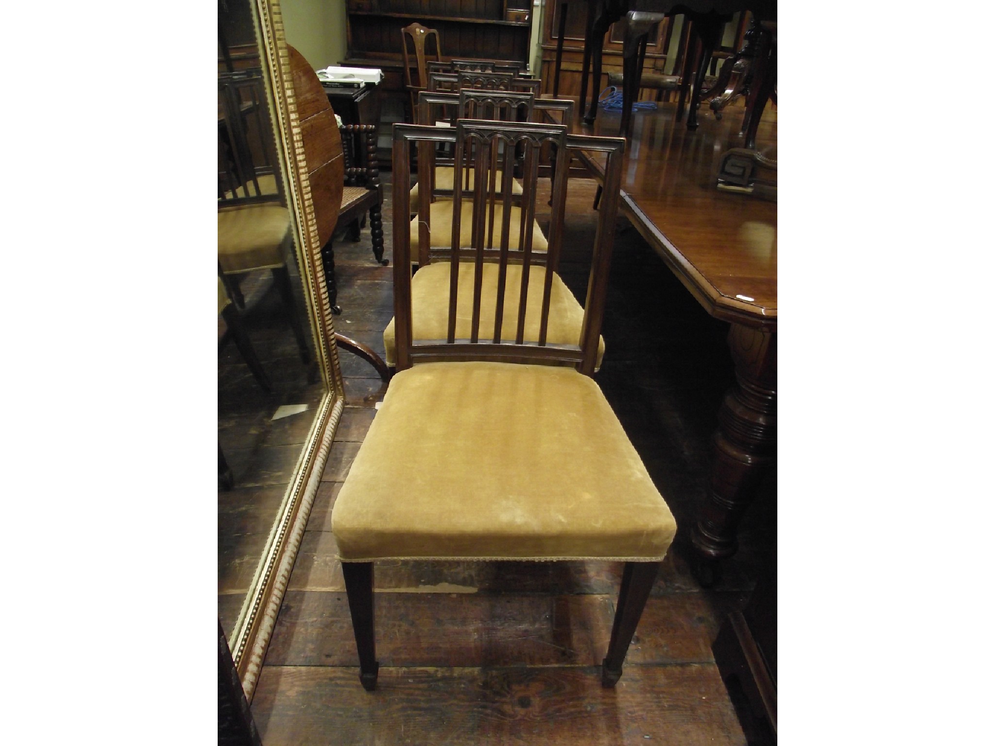 Appraisal: A set of four Georgian mahogany rail back dining chairs