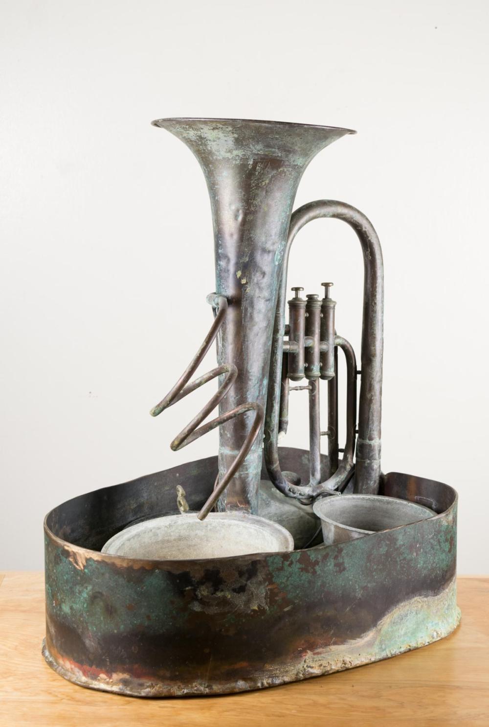 Appraisal: VINTAGE BRASS AEROPHONE TABLE FOUNTAIN featuring an upright -valve euphonium