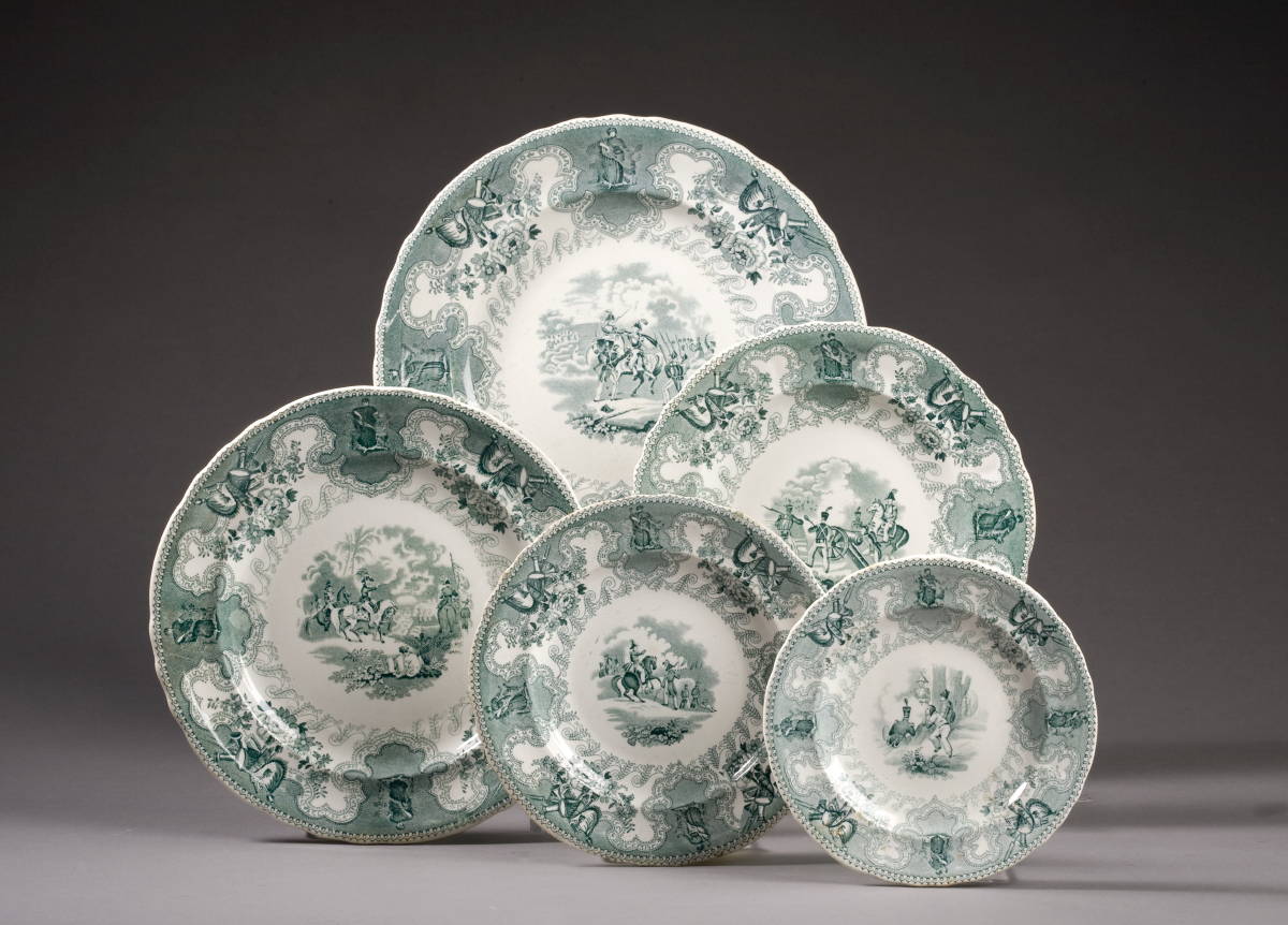 Appraisal: TEXIAN CAMPAIGNE FIVE STAFFORDSHIRE GREEN TRANSFER-PRINTED PLATES JAMES BEECH Comprising