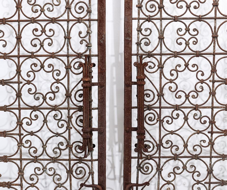 Appraisal: AN EXCEPTIONAL HAND FORGED ORNAMENTAL IRON ENTRY Two stationary panels