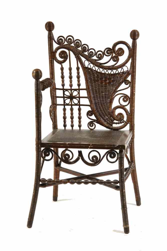 Appraisal: PHOTOGRAPHER'S CHAIR - Ca natural wicker photographer's corner chair stick