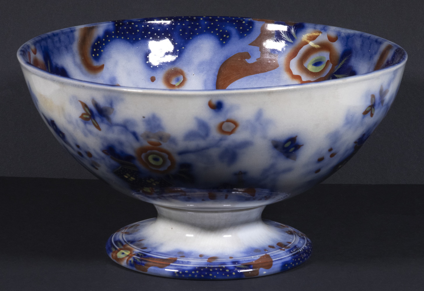 Appraisal: ENGLISH IRONSTONE PUNCHBOWL th c Footed Punch Bowl with exuberant