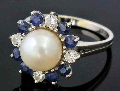 Appraisal: A s ct white gold pearl sapphire and diamond set