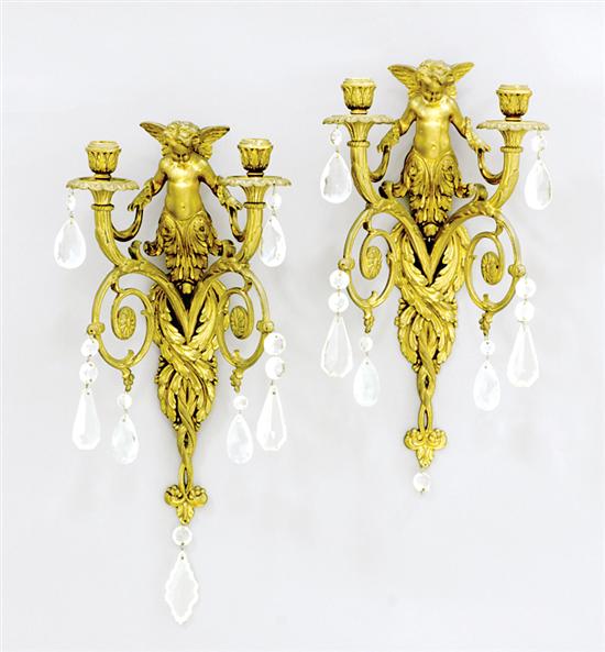 Appraisal: Pair French two-light bronze sconces with cherub backplate and scrolling