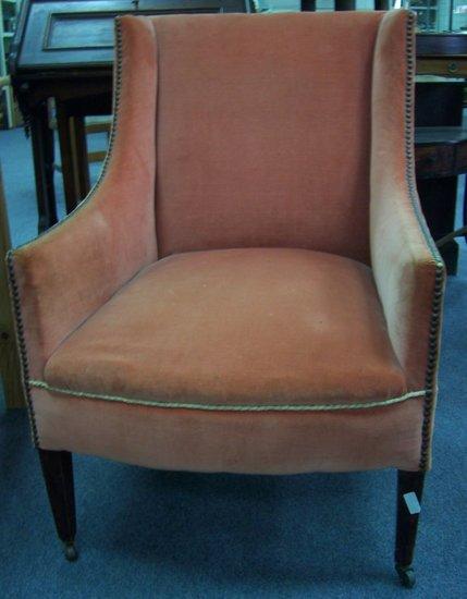 Appraisal: A square frame upholstered armchair on square taper legs