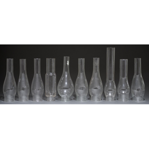 Appraisal: A quantity of glass oil lamp lamp chimneys