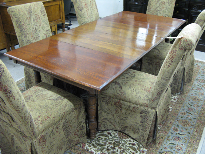 Appraisal: A VICTORIAN SQUARE OAK DINING TABLE WITH EIGHT LEAVES Eastlake