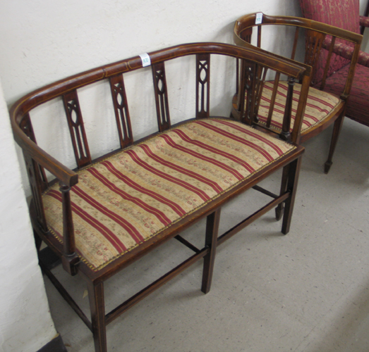 Appraisal: SHERATON REVIVAL MAHOGANY SETTEE AND ARMCHAIR English Edwardian c with