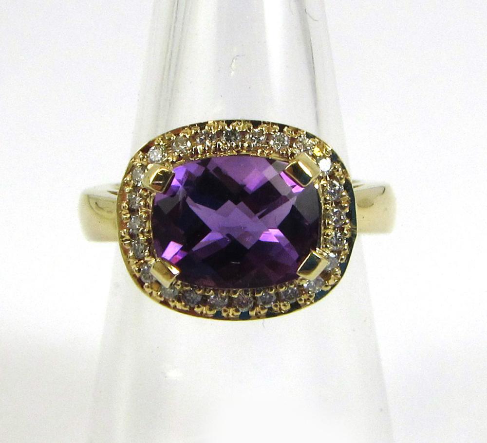 Appraisal: AMETHYST DIAMOND AND FOURTEEN KARAT GOLD RING with round-cut diamonds