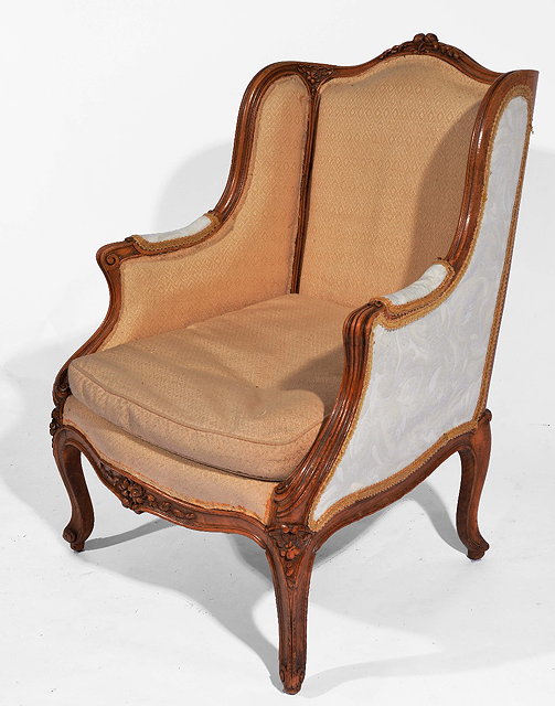 Appraisal: French walnut Louis XV fauteilwith shaped frame and front