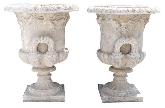 Appraisal: pair Cast stone campana-form garden urns thc featuring egg-and-dart rim