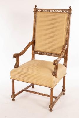 Appraisal: A walnut framed open armchair by Jonathan Charles with upholstered