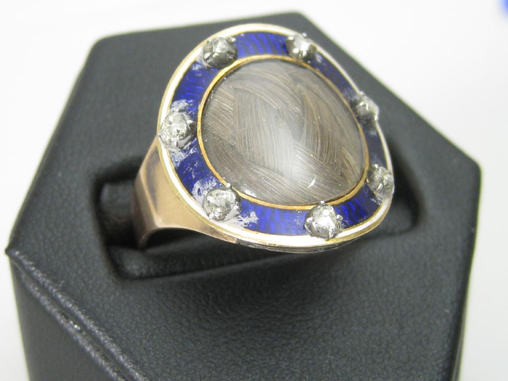 Appraisal: A large Georgian Mourning Ring with lock of hair within