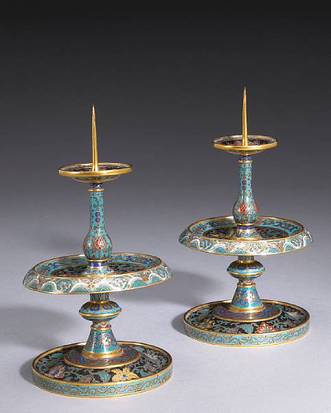 Appraisal: A pair of cloisonn enameled metal pricket candlesticks th Century