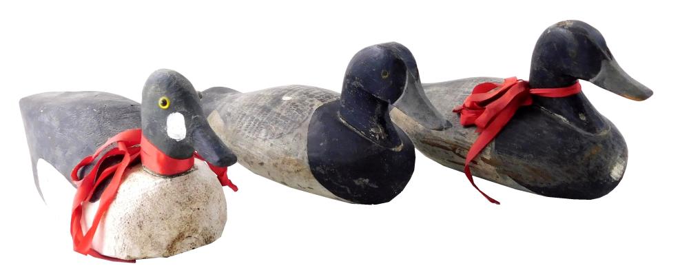 Appraisal: Three early decoys carved and painted wood ducks all unsigned