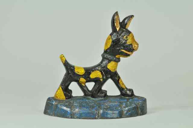 Appraisal: WHIMSICAL WALKING DOG DOORSTOP Cast iron marked '' ''Taylor Cook