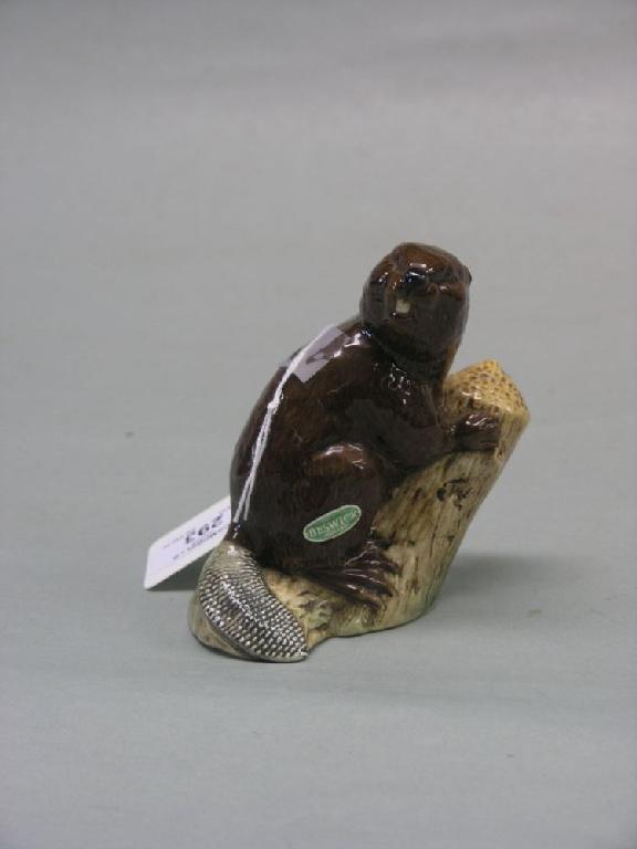 Appraisal: A Beswick Beaver on Log shape facing right designed by