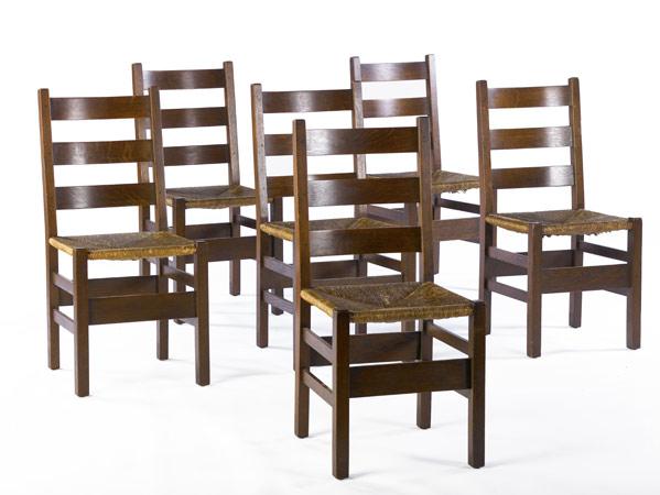 Appraisal: GUSTAV STICKLEY Set of six ladderback dining chairs no with