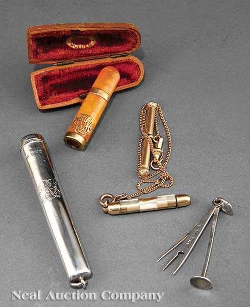 Appraisal: A Group of Antique Cigar Items including a small sterling