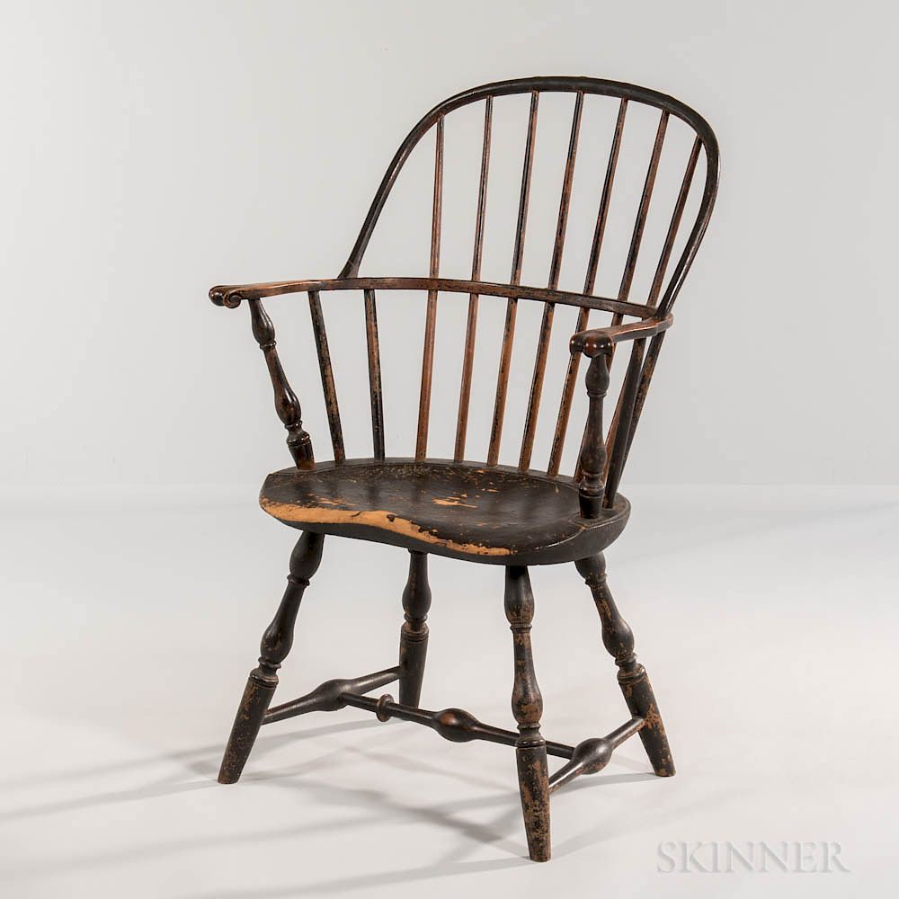 Appraisal: Black-painted Sack-back Windsor Chair Black-painted Sack-back Windsor Chair New England