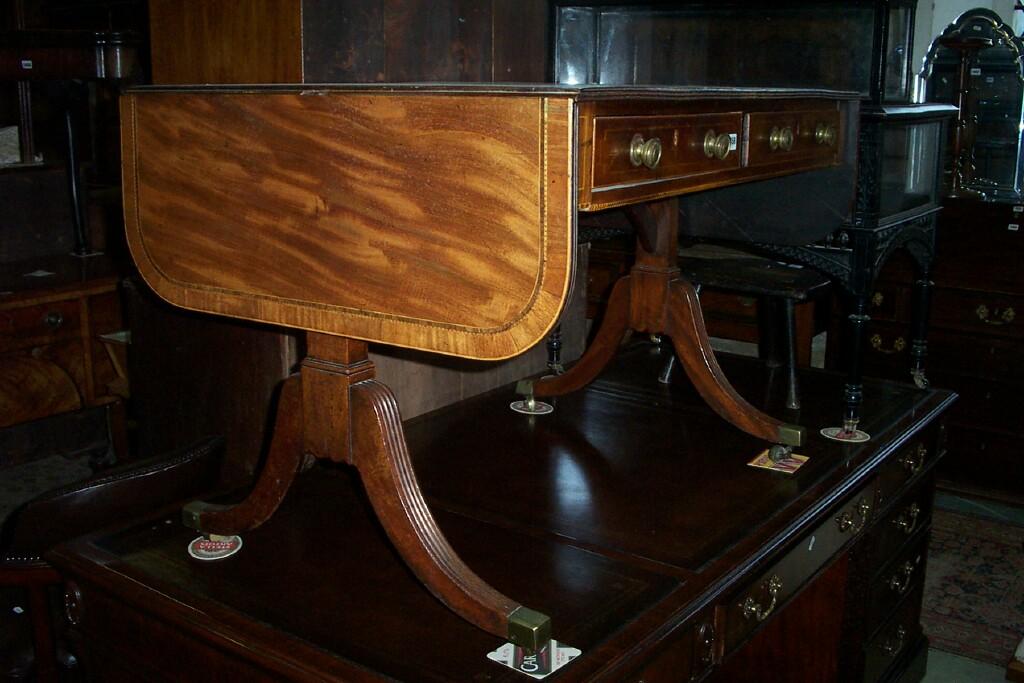 Appraisal: A Regancy mahogany sofa table of usual form with real