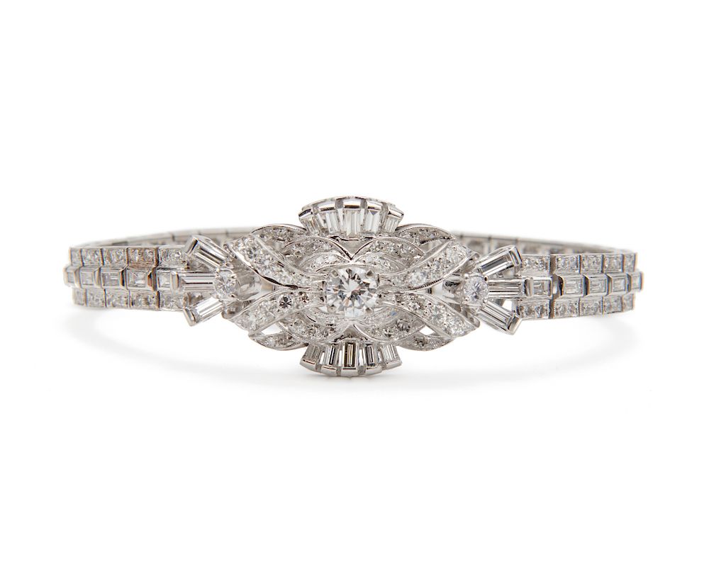 Appraisal: Platinum and Diamond Bracelet Platinum and Diamond Bracelet centering a