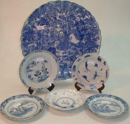 Appraisal: A Japanese blue and white pottery charger with scalloped rim