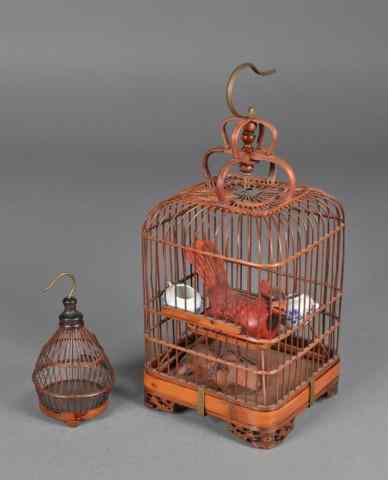 Appraisal: Chinese Bamboo BirdcagesTo include a larger cage with openwork carvings