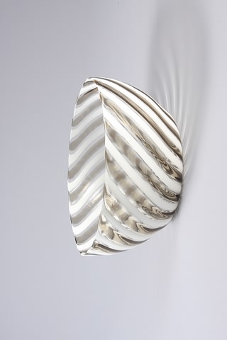 Appraisal: Bowl with swirled ribbed latticcino and clear glass bands Engraved