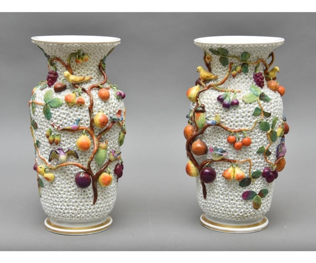 Appraisal: Pair of colorful German porcelain flowering fruit vases th c