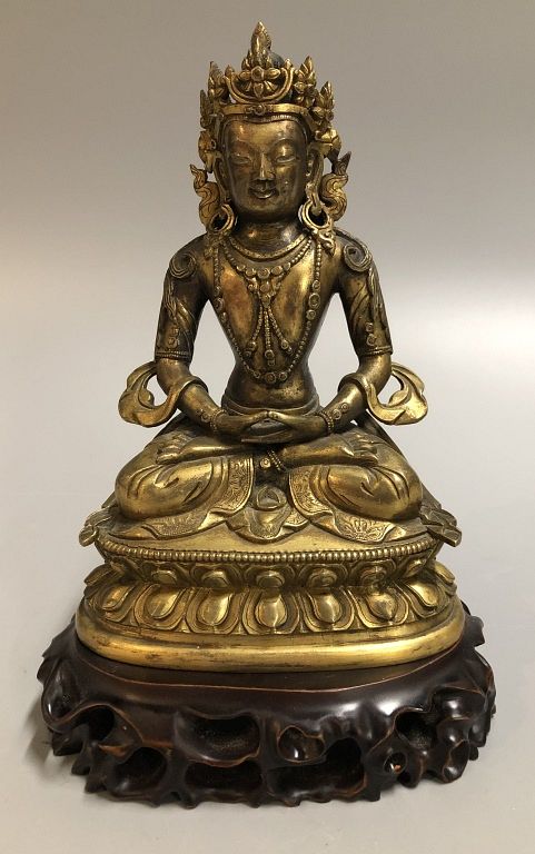 Appraisal: Chinese gilt bronze Buddha possibly th c in H Notice