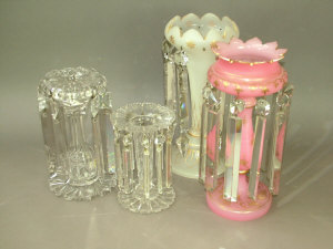 Appraisal: Pink glass table lustre with shaped and flared rim on