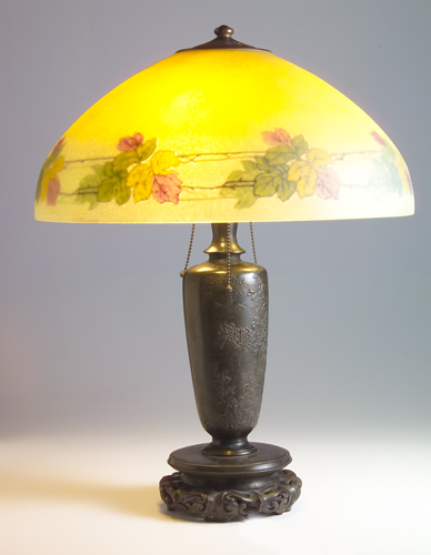 Appraisal: HANDEL Table lamp with three-socket Chinese urn-shaped bronzed base embossed