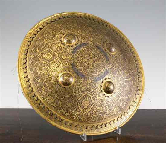 Appraisal: A late th century Indian gold overlaid steel shield dhal