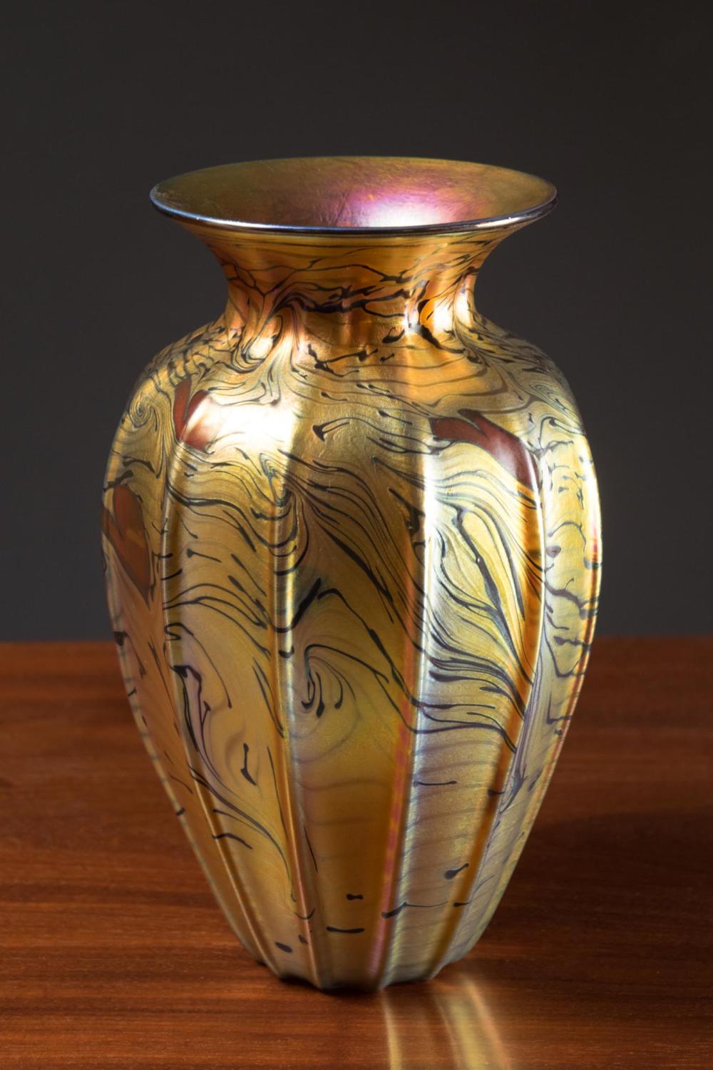 Appraisal: LUNDBERG ART GLASS VASE Lundberg Studios Davenport California ribbed heart