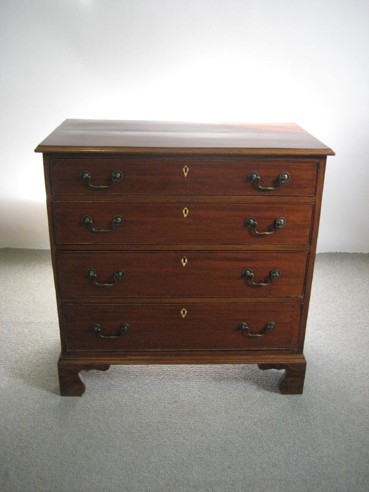 Appraisal: A MAHOGANY CHEST early th century the moulded edged top