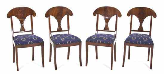 Appraisal: A Set of Four Biedermeier Side Chairs having a shaped