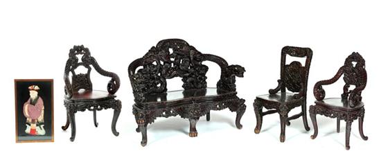 Appraisal: CARVED SETTEE AND THREE CHAIRS China late th century hardwood