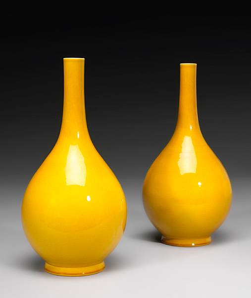 Appraisal: A pair of yellow glazed porcelain stick-neck vases Guangxu Marks