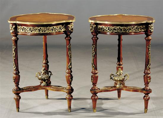 Appraisal: Pair Continental mixed wood and gilt-metal occasional tables shaped top