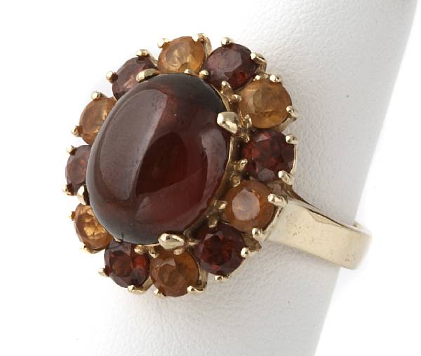 Appraisal: A garnet cabochon citrine garnet and k gold ring