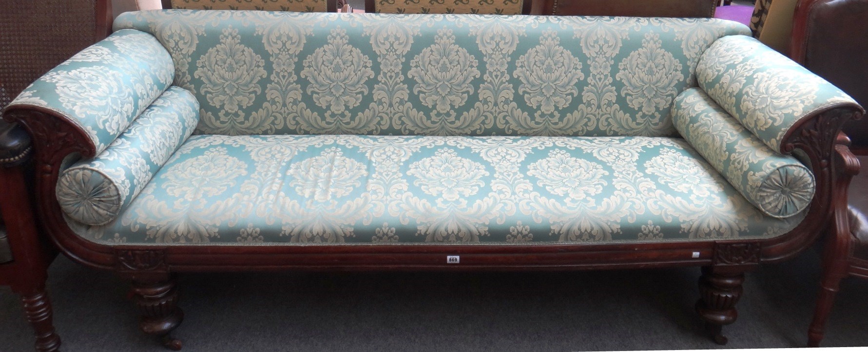 Appraisal: A William IV mahogany framed sofa on bulbous reeded supports