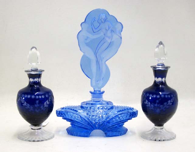 Appraisal: GLASS PERFUMES three pieces pair cobalt cut and engraved bottles