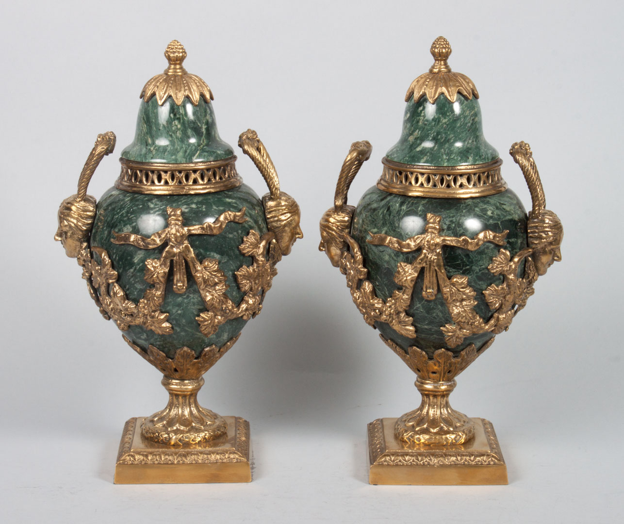 Appraisal: Pair of Louis XVI style urns variegated marble and gilt-metal-mounted