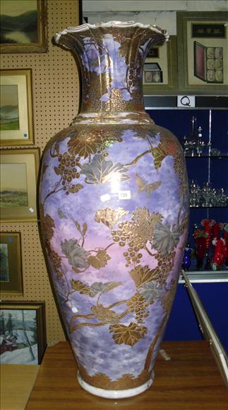 Appraisal: A Japanese Satsuma style pottery vase with purple ground and