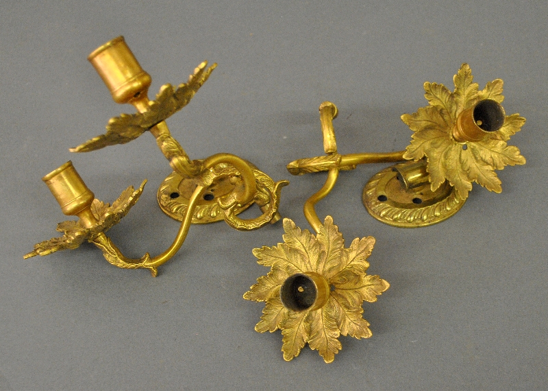 Appraisal: - Pair of brass Rococo double-branch wall sconces with non-matching