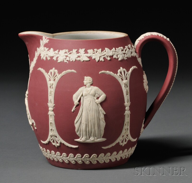 Appraisal: Wedgwood Crimson Jasper Dip Jug England c barrel-shape with applied